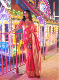 Pink handloom silk blend saree with intricate zari woven border and matching blouse