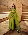 Green handloom silk patola print saree with matching blouse