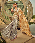 Off White and Beige digital printed satin saree with a glossy finish
