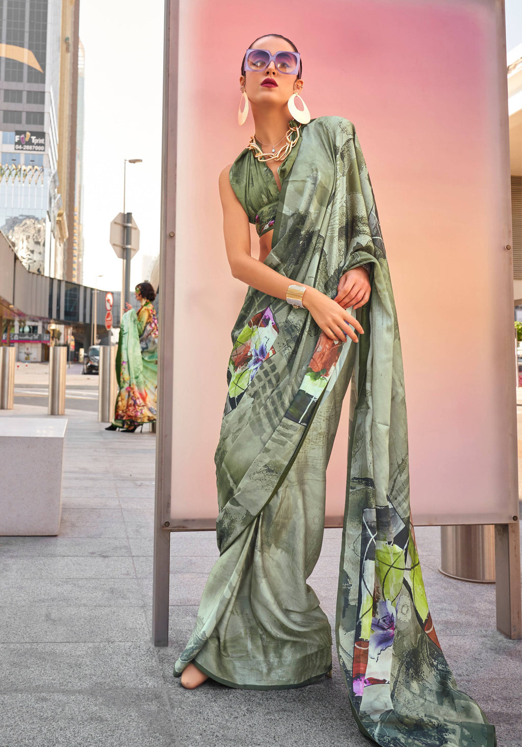 Light Olive Swiss Satin printed saree with traditional motifs and matching blouse.