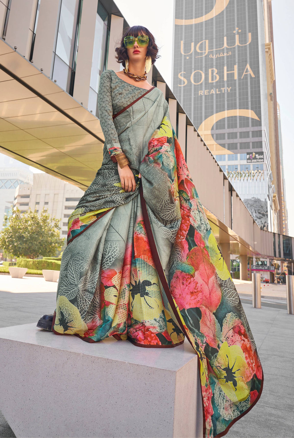 Grey Swiss Satin printed saree with matching blouse, styled for a professional look.