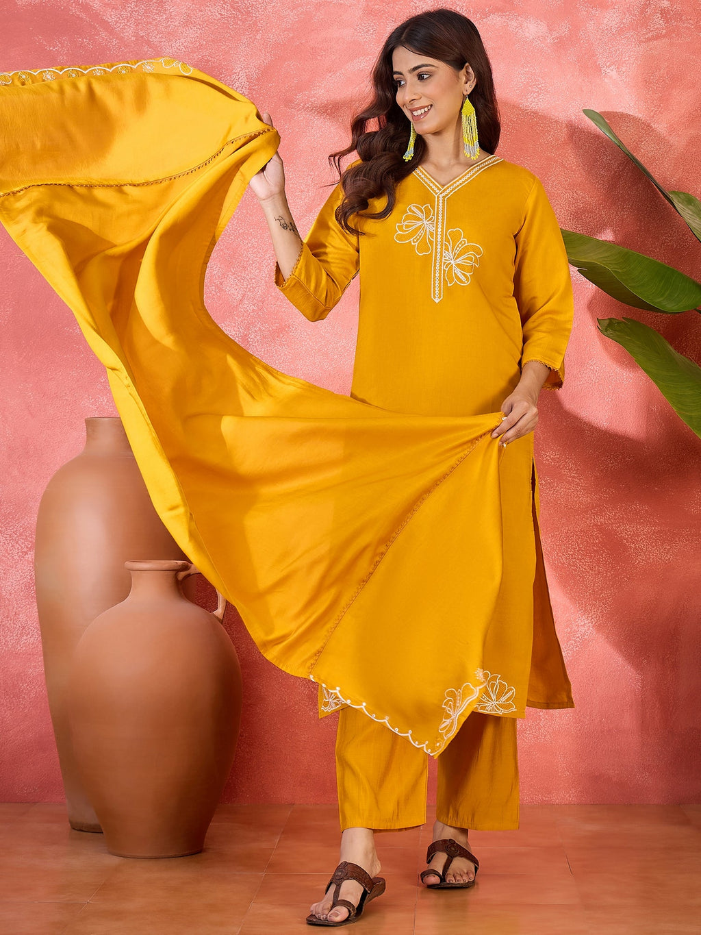 Deep yellow silk kurta set featuring embroidery and a V-neckline