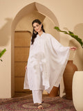 Model wearing a pristine ivory white silk kurta set with tonal embroidery details