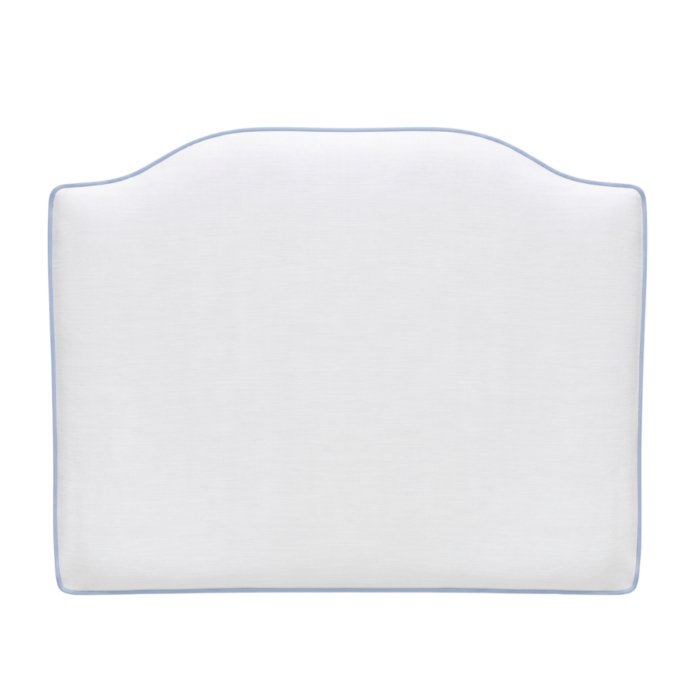 A stylish blue microfiber slub dorm headboard pillow styled on a dorm bed.