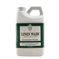 Bottle of Le Blanc Evergreen Woods Linen Wash 64 oz laundry detergent
