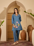 Elegant blue silk kaftan-style kurta set with artistic embroidery