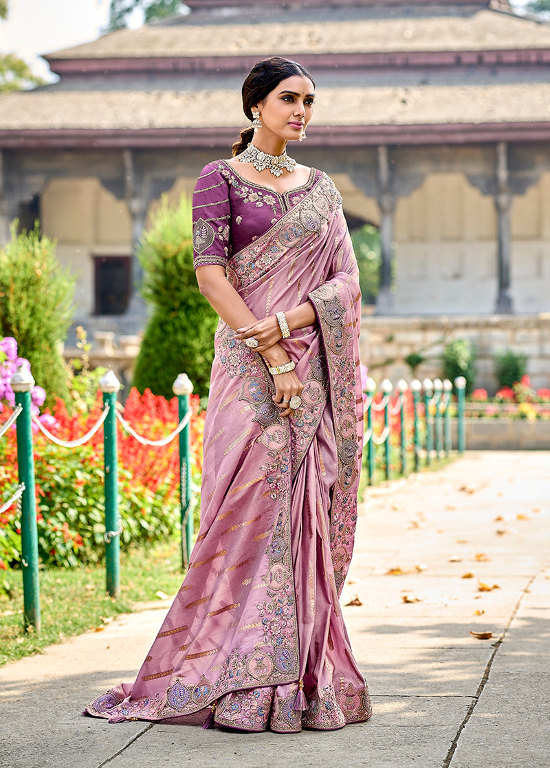 Mauve color Banarasi silk saree with beautiful embroidery and matching blouse.