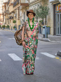 Model wearing a multi-colour floral satin georgette saree with tropical bohemian pattern