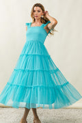 Tiered midi dress with frill accents and mesh detailing for a feminine look.