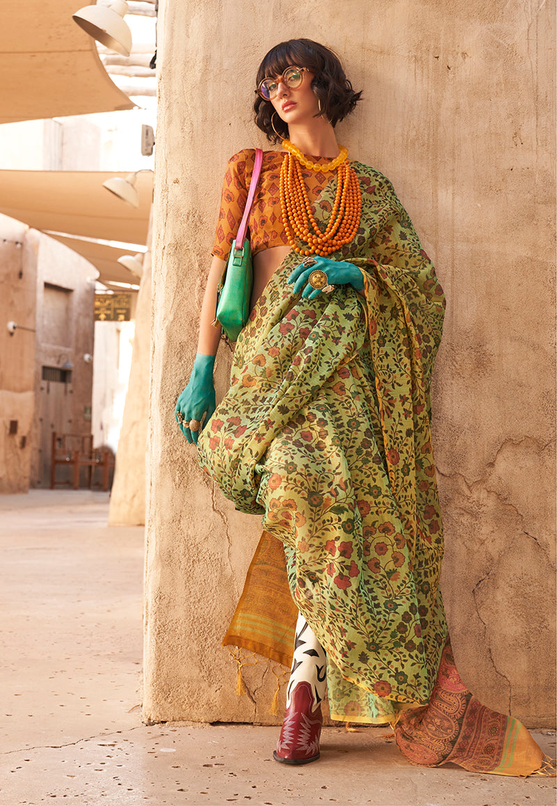 Light green designer tissue saree with floral prints