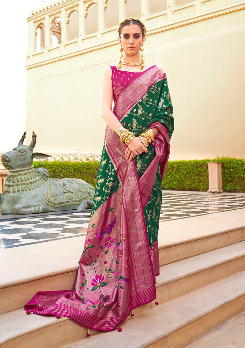 Dark Green soft silk saree with intricate traditional motifs.