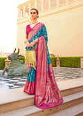 A beautiful blue soft silk saree with intricate traditional motifs and a luxurious finish.