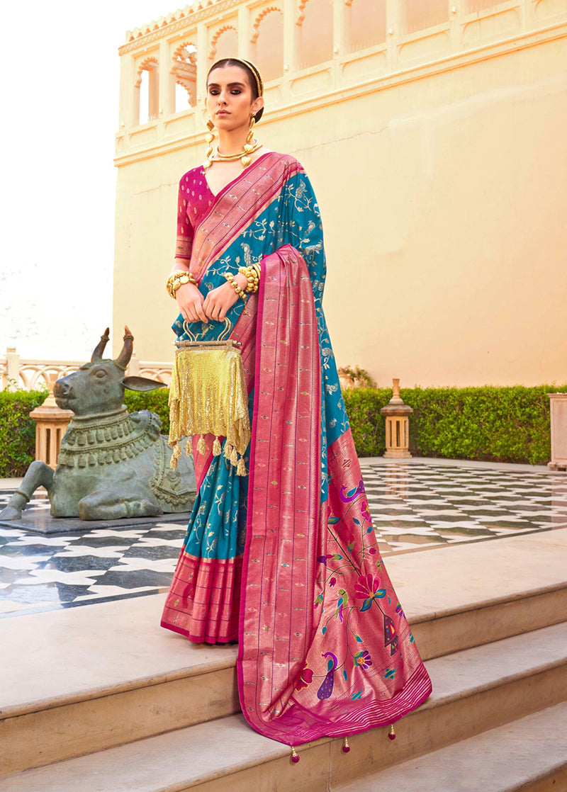 A beautiful blue soft silk saree with intricate traditional motifs and a luxurious finish.