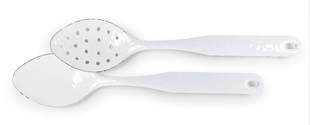 A 12-inch solid white enamelware serving and slotted spoon set with stainless steel trim.