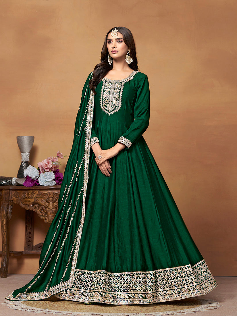 Dark green art silk Anarkali dress with elegant gold zari embroidery for traditional Indian events