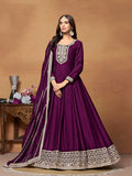 Purple art silk Anarkali dress featuring intricate gold zari embroidery and traditional silhouette