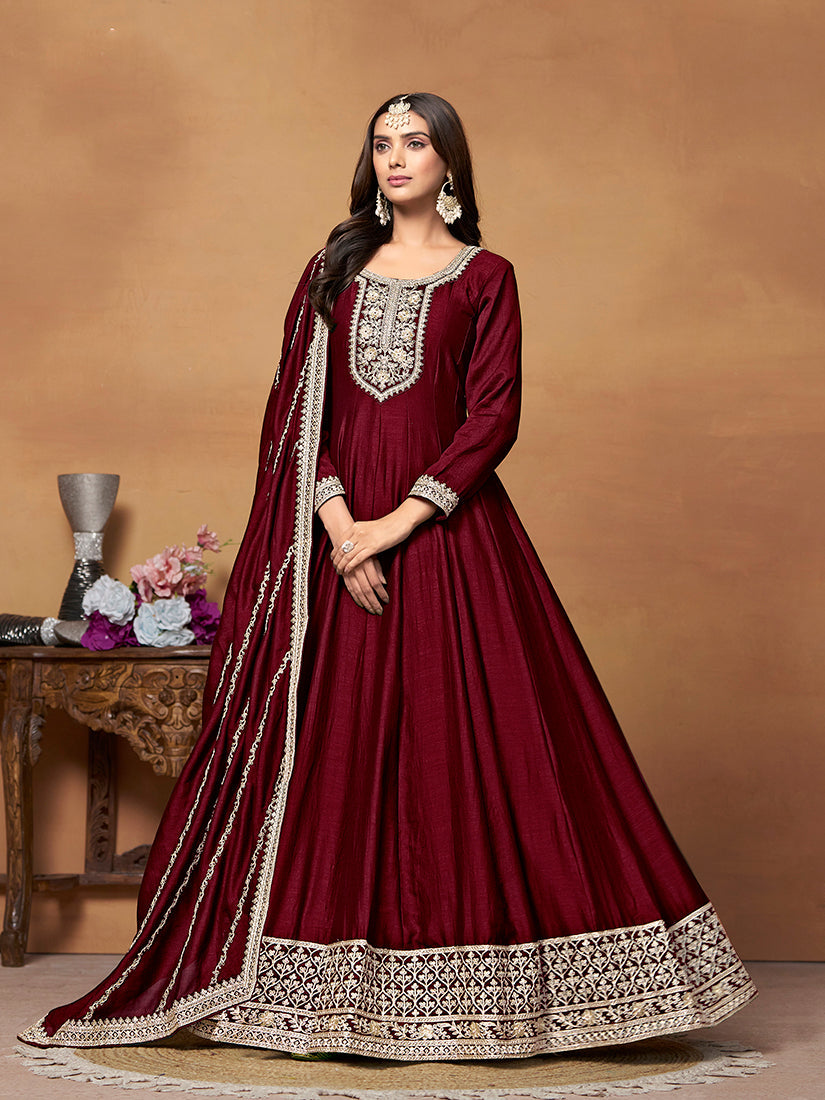 Wine art silk Anarkali dress with gold zari embroidery and traditional designer aesthetic