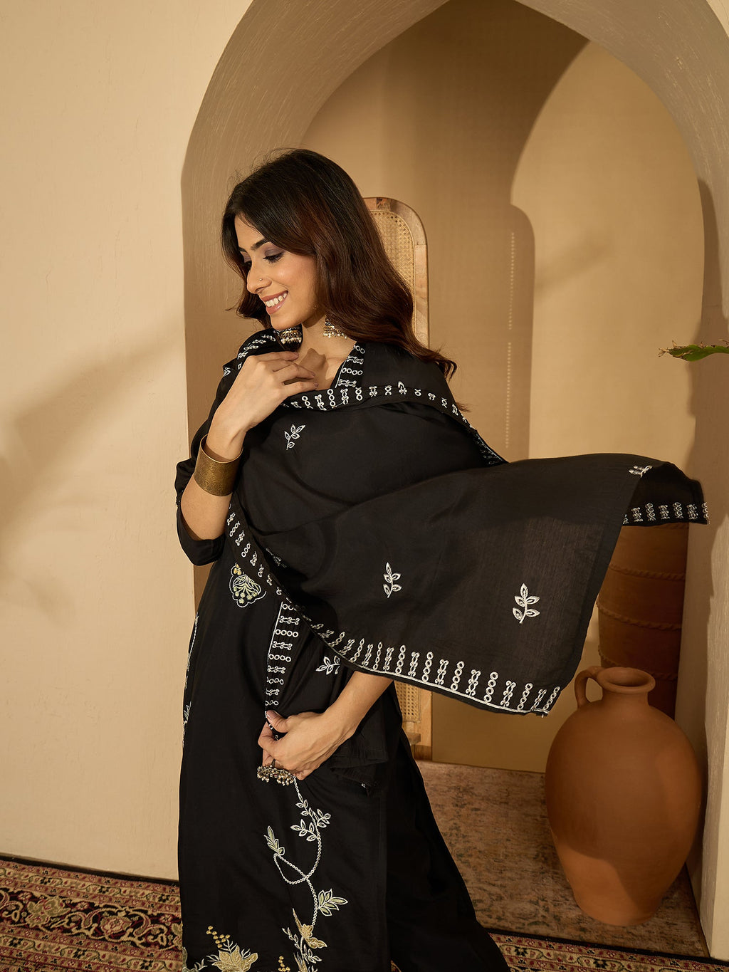 Black Silk Embroidered Kurta Set with Intricate Neckline Detail