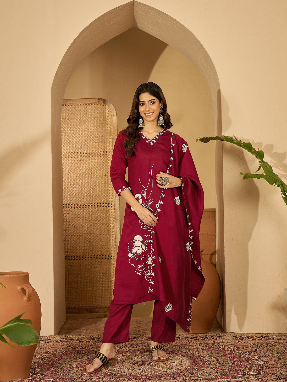 Maroon silk kurta set featuring an embroidered central panel