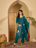 Vibrant teal silk kurta set featuring an intricate embroidered central panel on the neckline.
