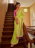 Lime colour nylon silk saree with intricate zari weaving and matching blouse.