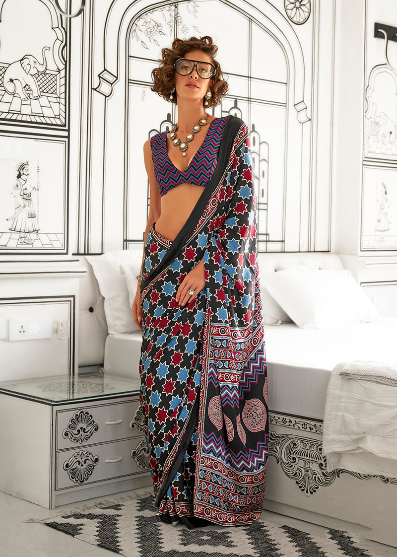Black satin crepe saree with abstract print detail