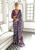Navy blue satin crepe saree with abstract print, perfect for formal occasions.