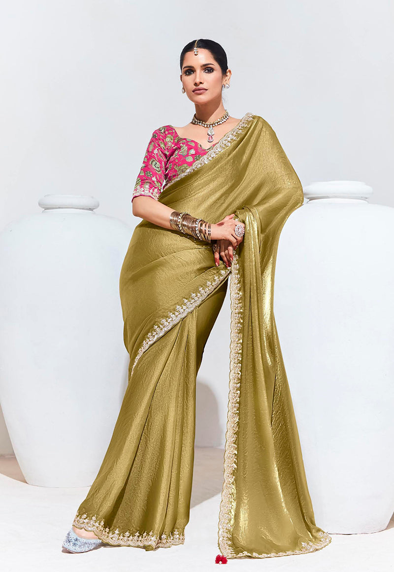 Olive festive saree with intricate embroidery and sparkling sequence work.