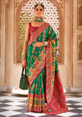 Green Banarasi silk saree with intricate Zari work and contemporary border