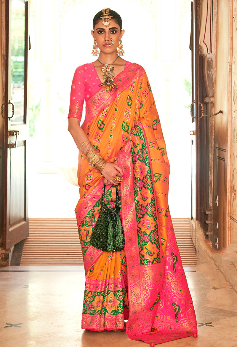 Yellow Banarasi silk designer saree with traditional weaving patterns