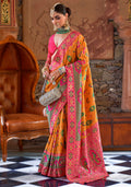 Mustard Banarasi silk saree featuring traditional ethnic weaving and gold accents.