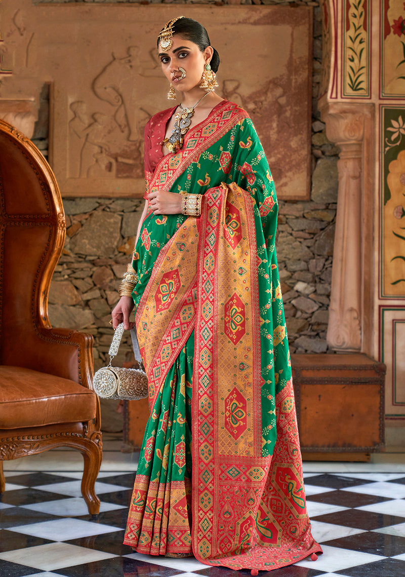 A elegant green Banarasi silk saree with intricate zari work, ideal for festive occasions.