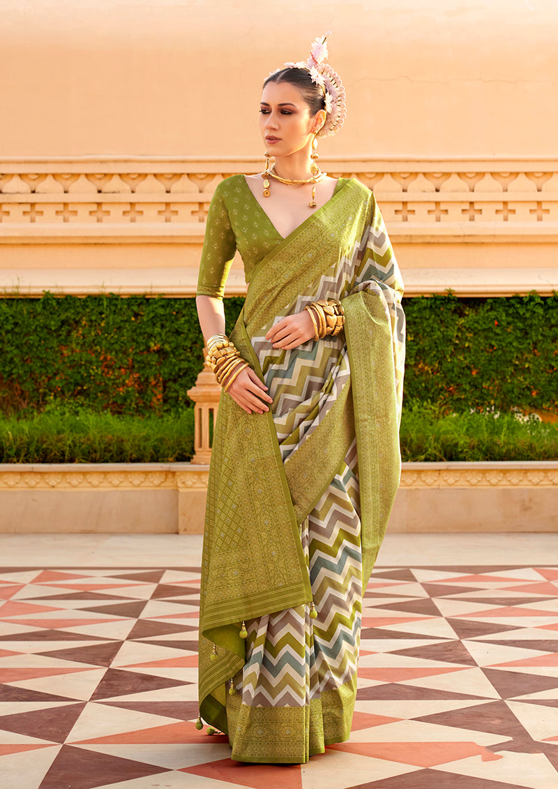 Sophisticated olive silk saree with intricate ethnic foil print details.