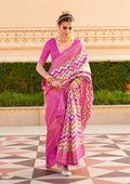 Magenta silk saree with ethnic foil print detailing