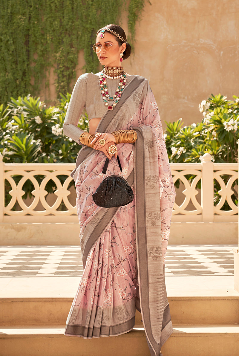 Light pink raw silk saree draped elegantly with foil print accents