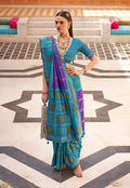 Aqua blue silk saree with modern Patola patterns and gold foil print