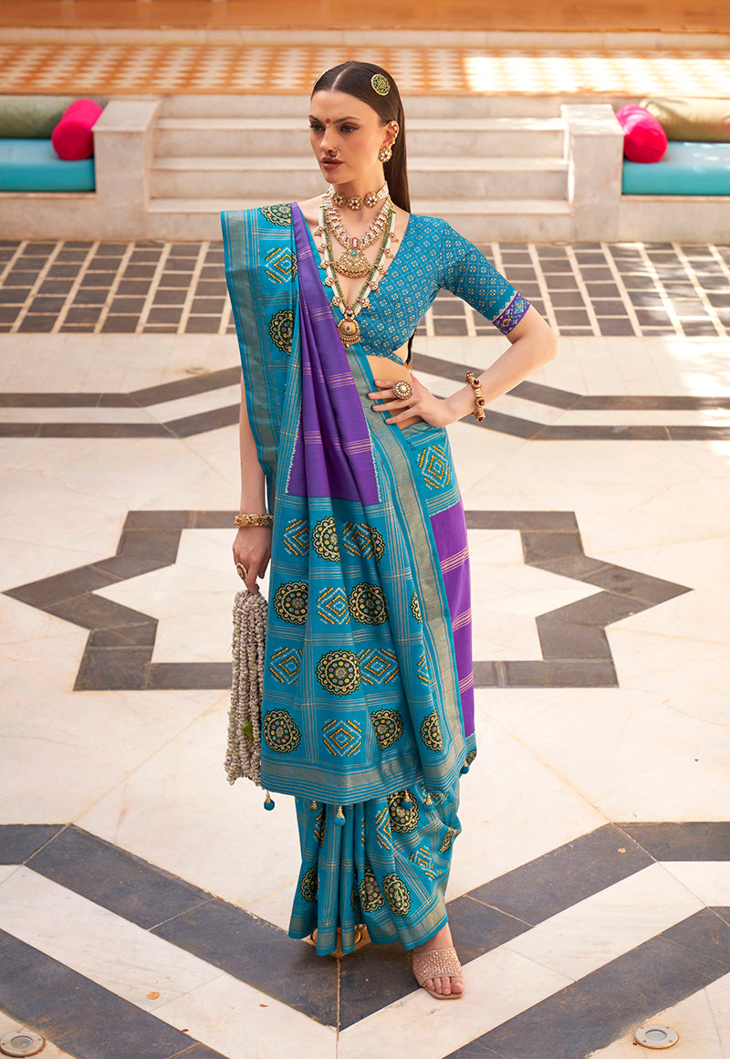 Aqua blue silk saree with modern Patola patterns and gold foil print