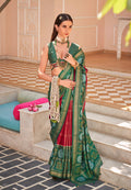 Dark green silk saree with traditional gold foil print and Patola patterns