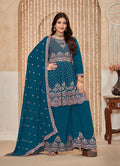 Teal-blue Chinnon and Santoon embroidered salwar suit