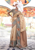 Regal Cream Katan Silk saree adorned with traditional gold zari weaving