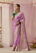 Mauve viscose saree with elegant floral prints and traditional weaving.