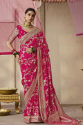 Rani Pink viscose saree with floral printed pattern and weaving