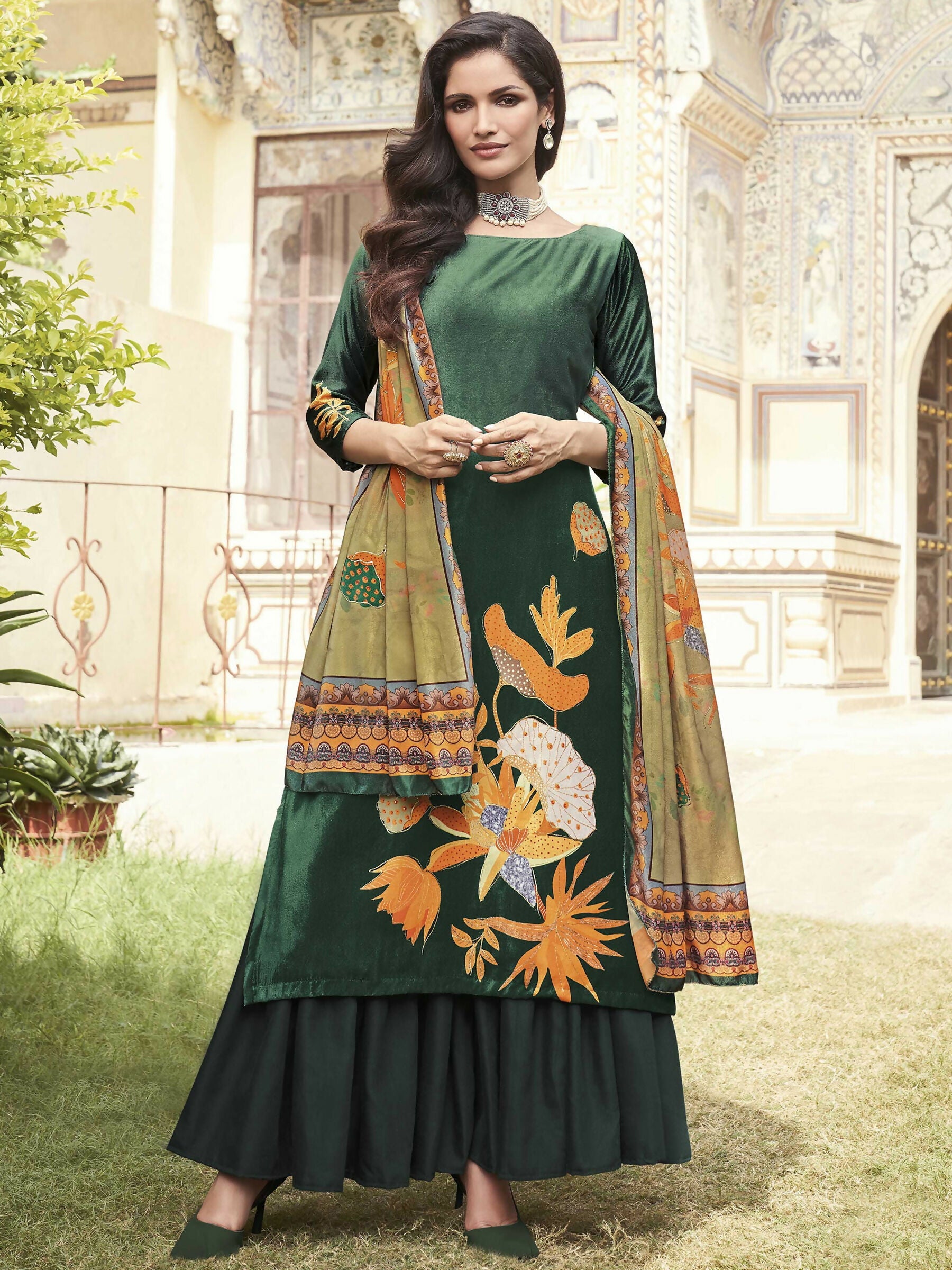 Green velvet A-line kurta featuring floral digital prints, paired with matching pashmina palazzo pants.