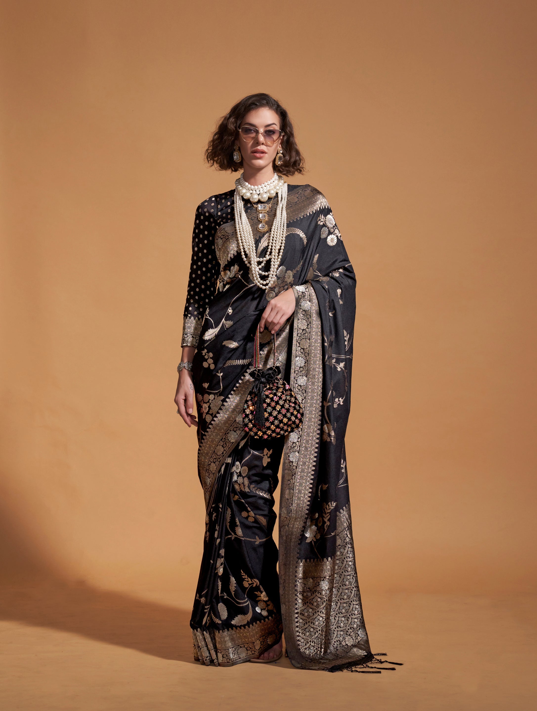 Black silk traditional saree with elegant weaving design
