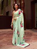 Light Green Crepe Satin saree with digital prints draped elegantly
