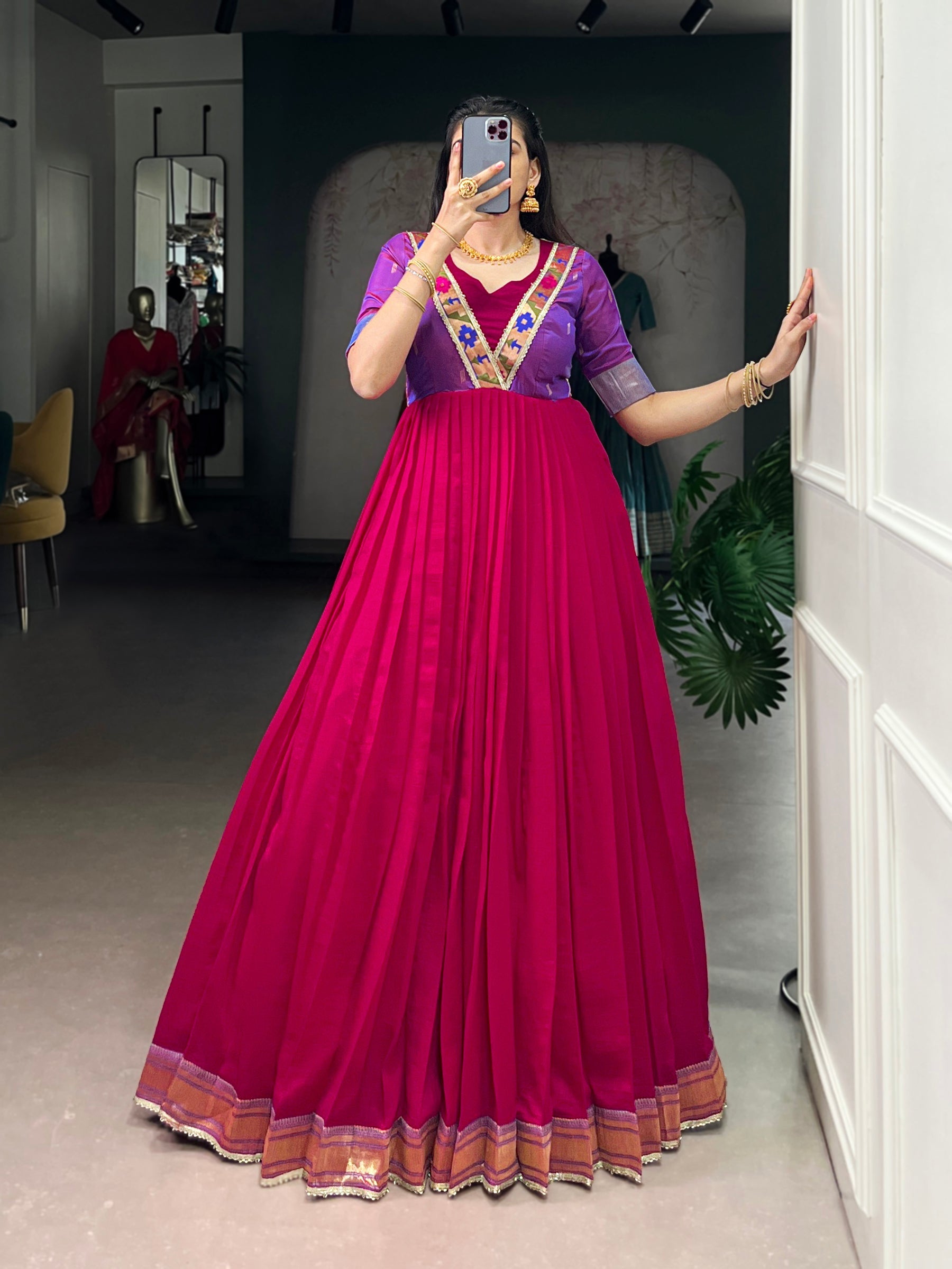 Rani pink Vichitra silk gown with Zari weaving and lace trim