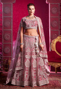 Pink net wedding lehenga choli with sequin and embroidery work