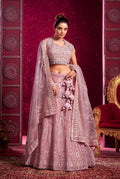 Pink net wedding lehenga choli with sequin and embroidery details