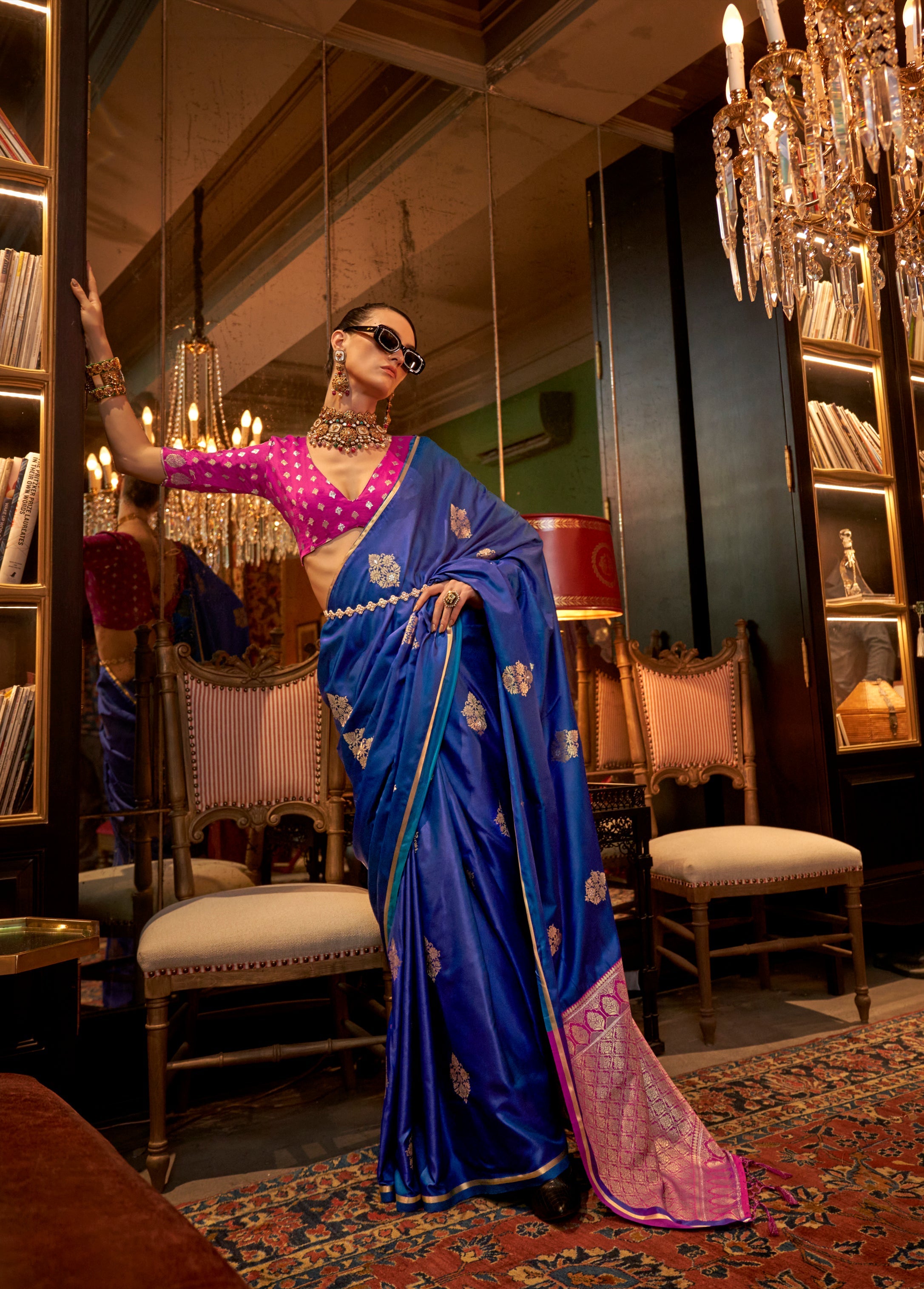 Royal blue satin saree with detailed weaving work for formal occasions