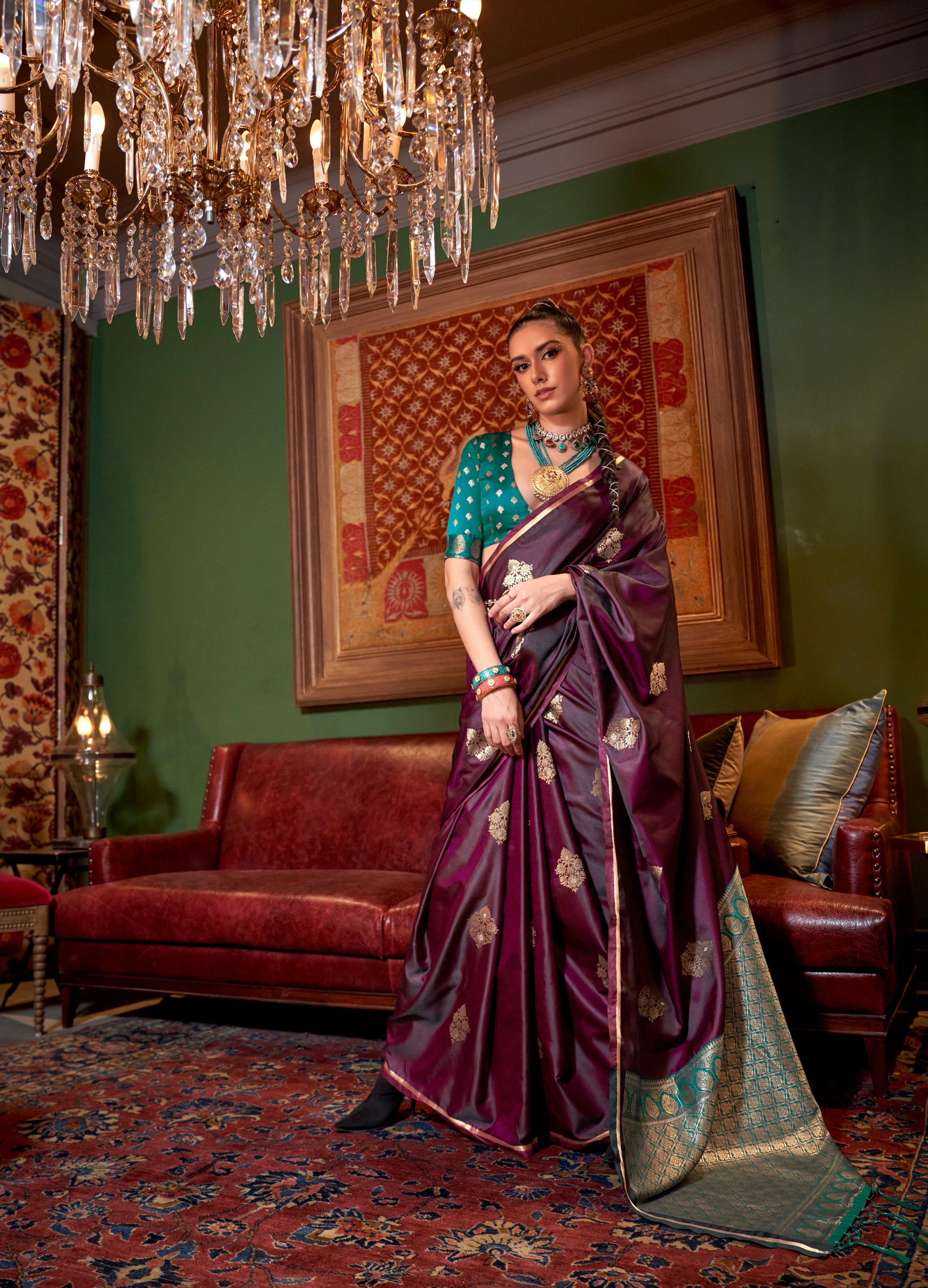 Luxurious wine satin designer saree with detailed weaving for evening wear